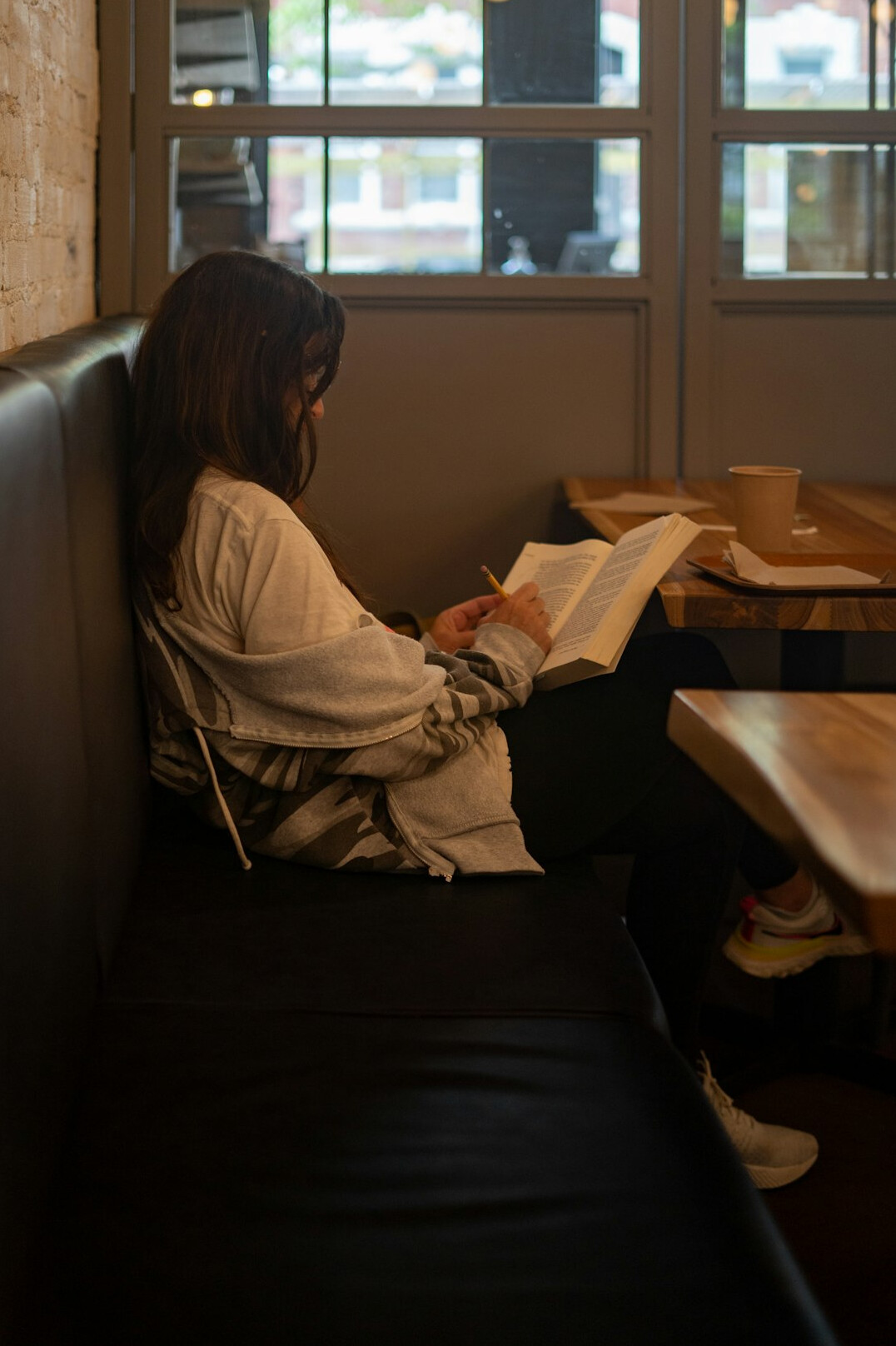 person studying negotiation book
